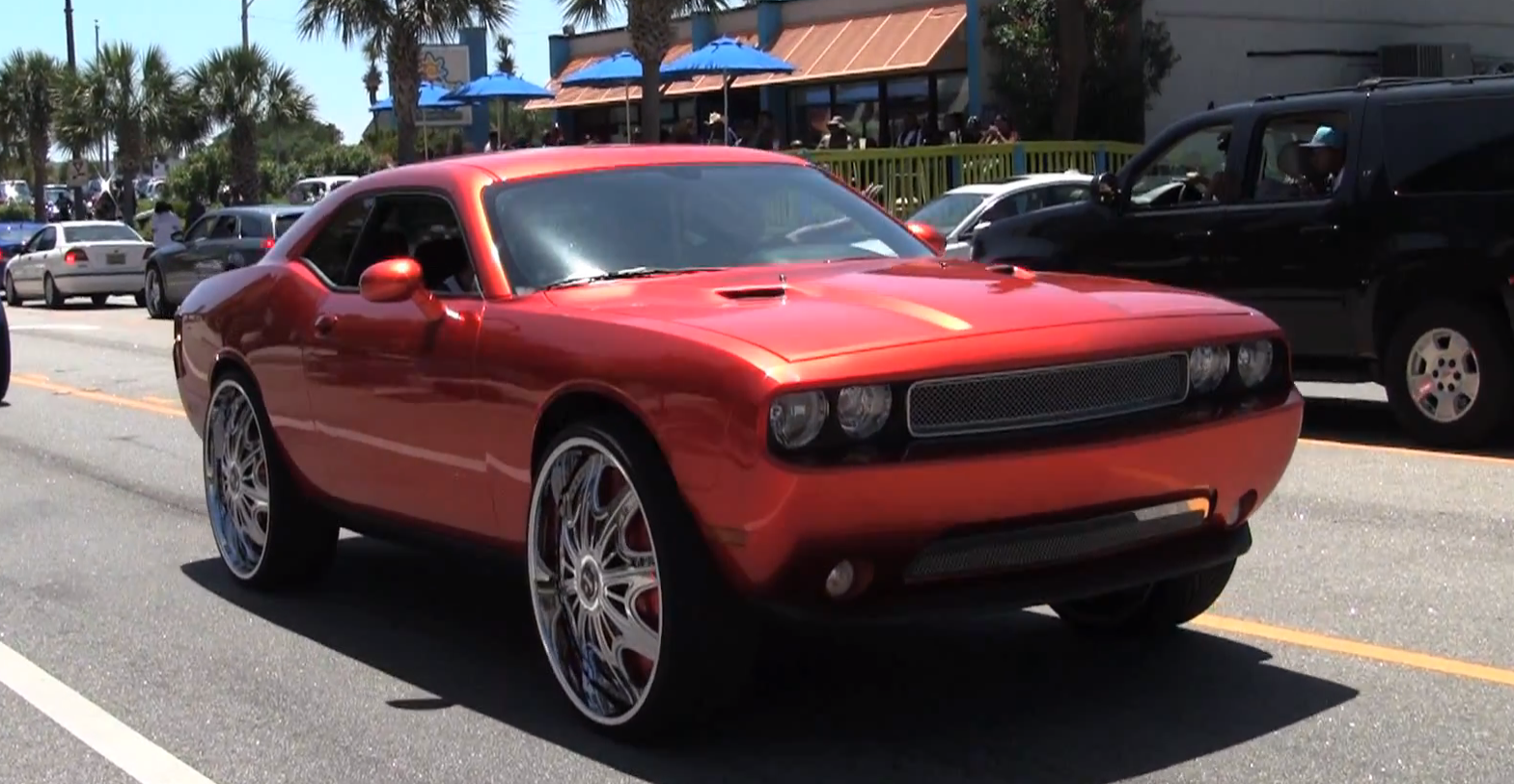 challenger-floates-on-28-inch-dub-wheels